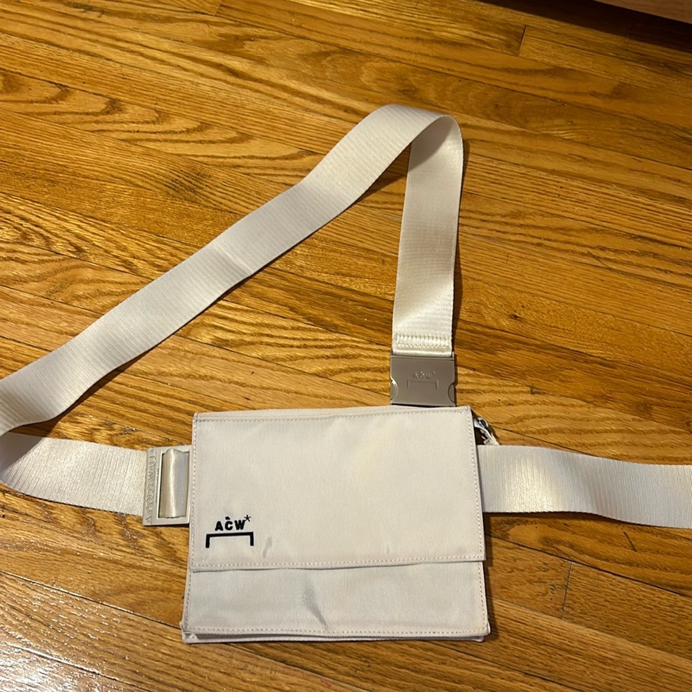 A cold wall utility crossbody pouch